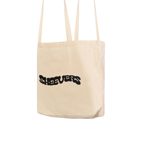 beige sheevers bag with black puffed print
