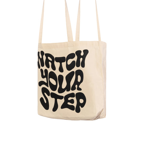 beige sheevers bag with black puffed print
